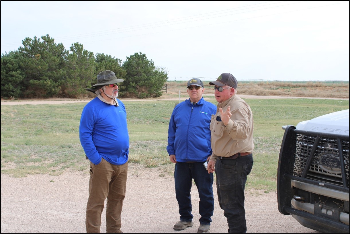 AquaterreX PhD Hydrogeologist and Senior Hydrogeologist meeting with New Mexico farmer/rancher